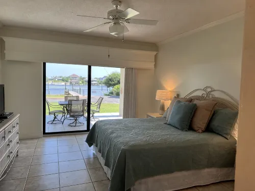 Ground floor condo with walk out access to docks, fishing piers and pool