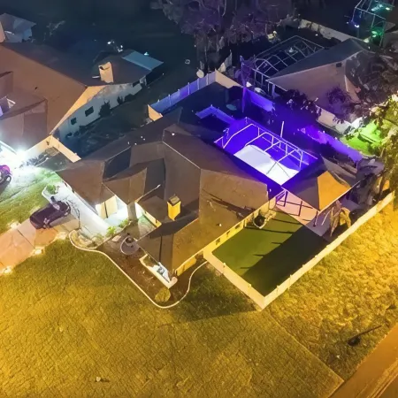 The Perfect Gateway Home with a large pool area, Gazebo, all fenced in.