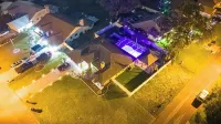 The Perfect Gateway Home with a large pool area, Gazebo, all fenced in.