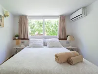 Apartment in Maspalomas with spacious garden, 30 m to the beach. Private garage Hotels in Meloneras