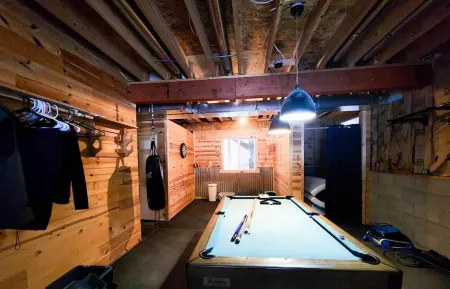 Six bedroom home with a hot tub, pool and an outdoor bar on a two acre lot.