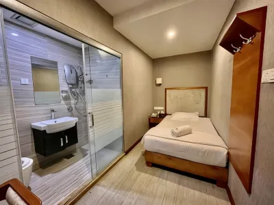 Fan Holiday Hotel Hotel in zona TARUC Cyber Centre CITC