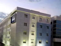 Aditya Hometel Hotels near NIPER