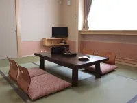 Yoshifumi Hotel di 