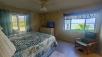 Steps to Sand & Sea - Oceanfront Condo with Pool in Quiet Cayman Kai/Rum Point