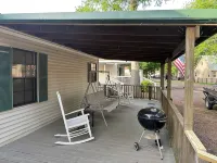 Fish cleaning station, screened porch, covered front porch, fire pit, 3 BR