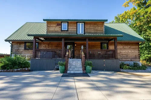 Majestic log home on 20 private acres near ski resort w/pool & hot tub