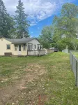 Cute Cabin on Big Pine Lake with a Large Fenced Yard and Lake Access