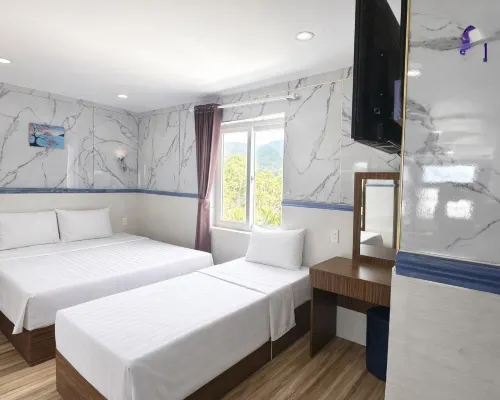 Q Songchi Hotel Hoteles cerca de Playa de Dat Doc
