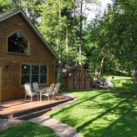 Spacious Summer Escape: Private Backyard, Dock & Fire Pit, Channel Waterfront