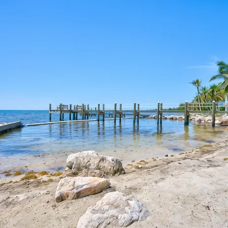 Wide Horizon oceanfront.  4 bedroom, 4 ½ bath,  kayaks, pool + observation deck.