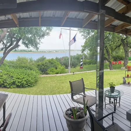 Lakefront Granbury Home, Sleeps 16, Hot Tub, Dock w/Lift, Jet Ski, & Fishing