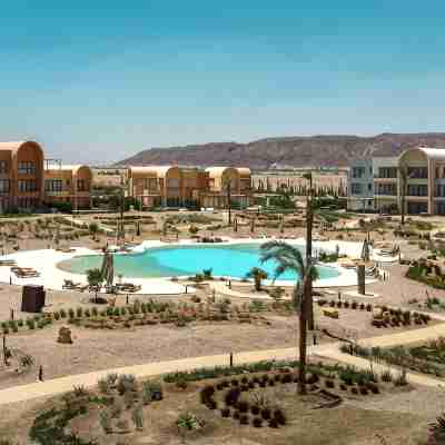 Desert-Chic 2BR + Loft | Pools, Balconies, Gouna Fitness & Recreational Facilities