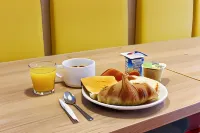 بريمير كلاسي فيتروليس - مارسييل أيروبورت - فطور