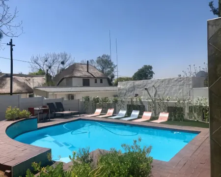 Muco Guest House โรงแรมในแซนด์ตัน