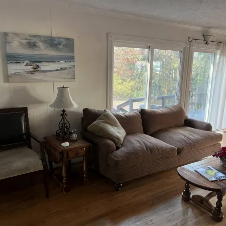 Cozy Cottage with access to and partially obstructed views of the bay.