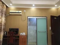 Yilong Happy Home Hotel - Inns