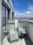 Roof top lighthouse and sea view