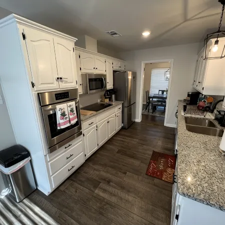 The Lily Pad. 3 bd/1ba. 4 beds. Center of town! Fenced backyard!