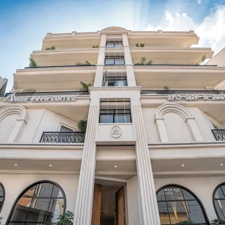Aura Inn & Suites Отели в г. Округ Майсу́ру