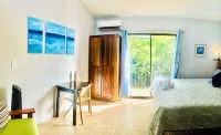 Ocotal Hilltop Condo: Mountain Views, 4 Pools, 3 Min to Beach, 100 Mbps WiFi