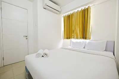 Simply Living 2Br at Bassura City Apartment by Travelio