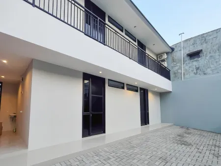 RedDoorz Syariah Near Rumah Sakit Soewandhie Отели в г. Kenjeran