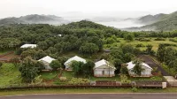 Tiki Farms Отели в г. Амбот