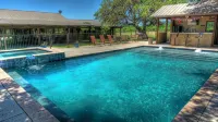 6-bedroom Lodge on 12 acres in Concan, Texas.  Swimming pool & hot tub.