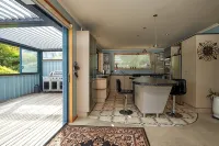 Akaroa Holiday Home.  Spacious, sunny, harbour views and close to town. Sleeps 8