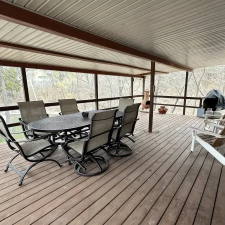 Updated 3 bedroom lakefront home offers privacy and comfort w dock on Grand Lake