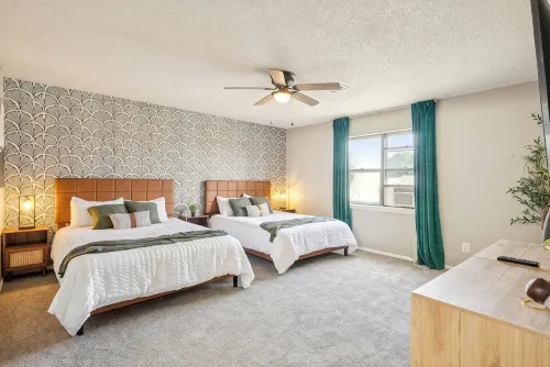 The Full House— Beds~Near Rose District~Shuffleboard~Poker Room~Game Room