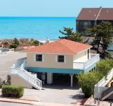 Coastal Palms Inn and Suites