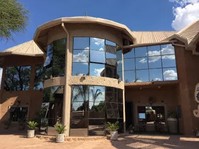 African Home Hotel Отели в г. 
