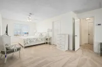 Pool! DOCK! Two Master Bedrooms. Private & public beach access. Sleeps 12