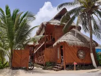 Palmeras de Mahahual Cabañas Hôtels à : Majahual
