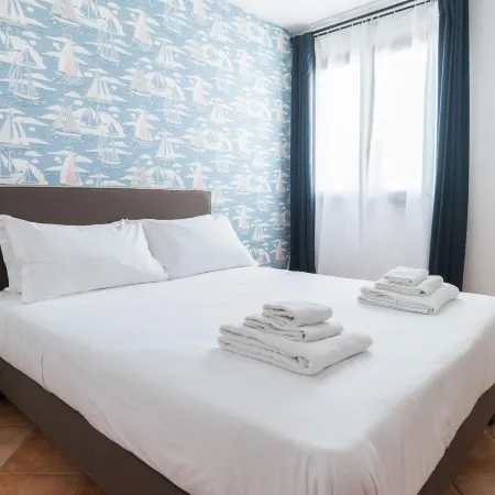 Italianway - Ottoventi Apartments Отели рядом с достопримечательностью «Пляж Кала-Мадонна»