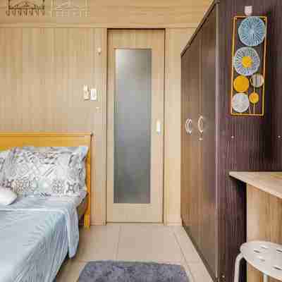 The Golden Shore Suites Rooms