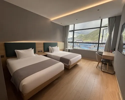 Huayi Business Hotel Hotels in Baqen