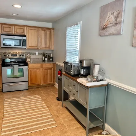 Beautifully Renovated 1st Floor Condo - Walk to Beach - Sleeps up to 8