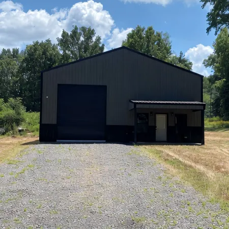 TAKE IT EASY Fishing Cabin. Large enclosed bay for storing the boat.