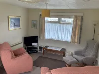 Charming  Bungalow  , much upgraded  Near a beach ,farm shop and steam railway