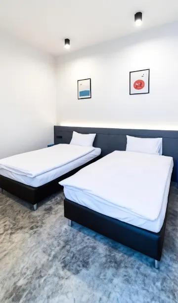 ห้องเตียงแฝด พร้อมห้องน้ำรวม