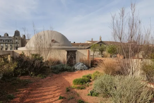 Hostal Porxos Garden Отели в г. Барселона