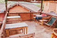 Guanjing Inn Nuodeng Ancient Village - breakfast