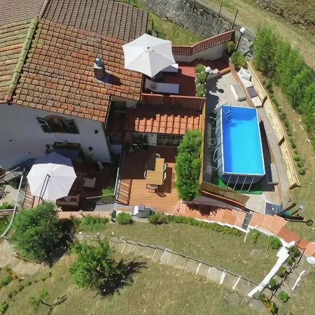 Vacation home with hillside view and pool
