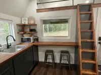 Cozy Tiny Home tucked in the woods w/ firepit Hotels in Covington County