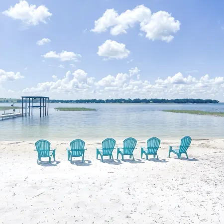 Beautiful home with white sand beach on stunning Crooked Lake
