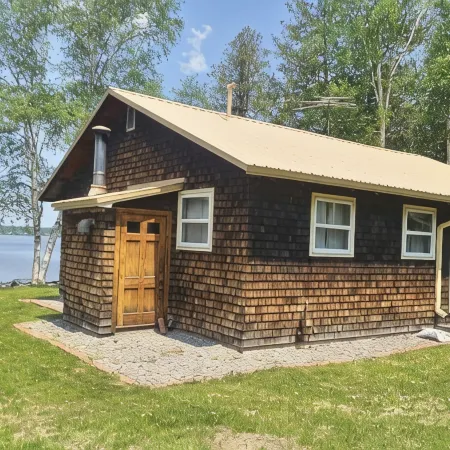 Relax in Aroostook County at this little piece of heaven right on the lake!