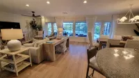 Golf cart distance to WEF! Charming 3 bedroom waterfront home with heated pool. - 3-Star